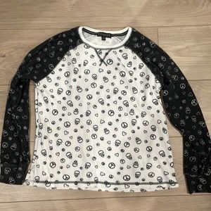 Baseball Tee with Hearts, Skulls, and Peace sign design.